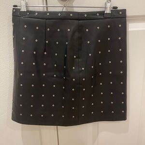 Leather studded mini skirt